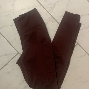 Soma merlot colored leggings with tech pocket on side of each leg